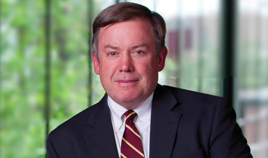 ASU President Michael Crow standing in Fulton Center atrium