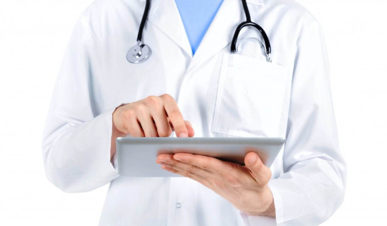 Physician with iPad Physician with iPad