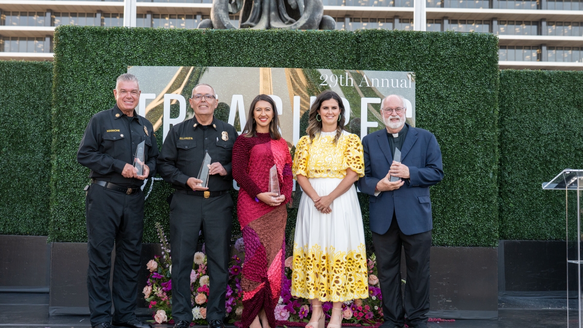 Four honorees stand with awards in hand along with the Central City Association of Los Angeles president at the 2025 Treasures of Los Angeles awards. 