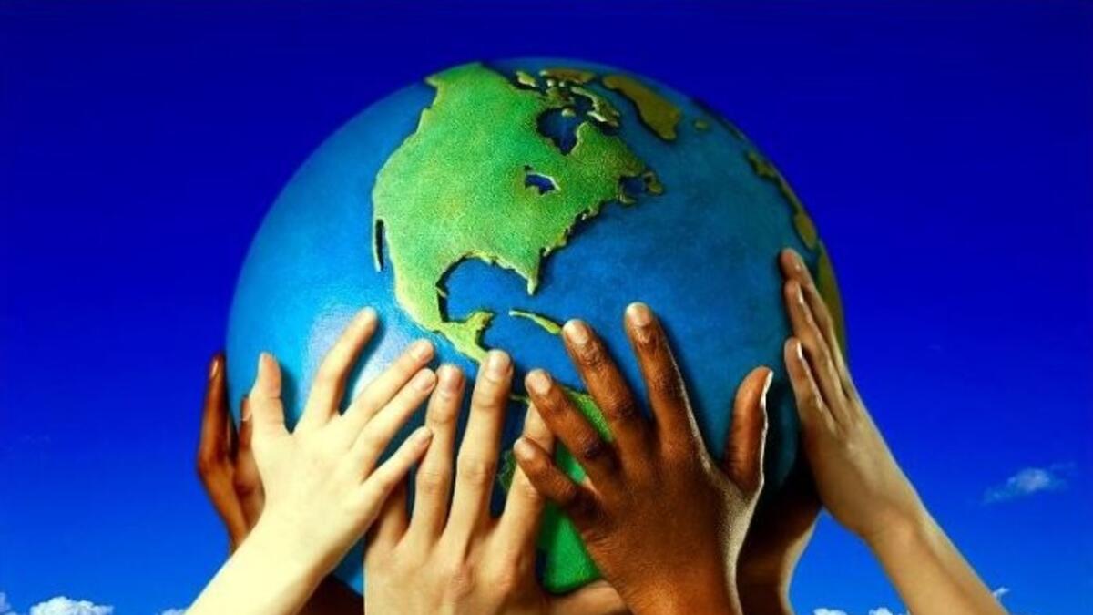 Hands holding the Earth